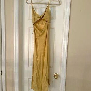 Brand new Elegant Yellow cutout Dress